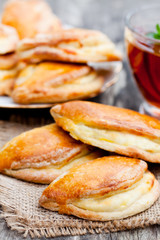 Homemade  cottage cheese pies with a cup oftea