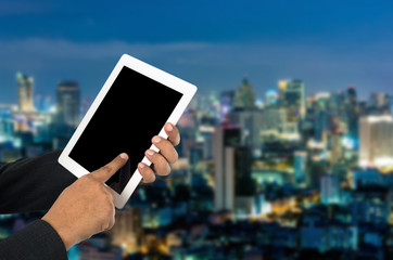 Businessman using tablet pc.