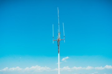 Tall very high frequency antennas on tower mast