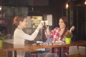 Best friends ladies in cafe
