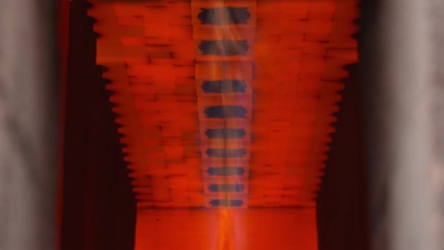 A gas-fired industrial furnace heats raw materials