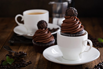 Gourmet chocolate cupcakes with a candy on top