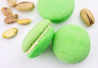Pistachio macaroon on white background