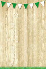 green and white pennants on wooden background