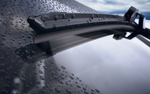Car windshield with rain drops and frameless wiper blade closeup. 3d render
