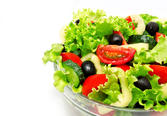 Fresh vegetable salad isolated on a white