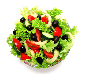 Fresh vegetable salad isolated on a white