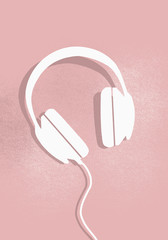 Digital composite image of headphones on pink background