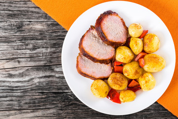 Oven Baked new potatoes with pork chop