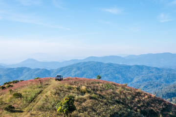 Cars parked on a hill overlooking a beautiful mountain,Chiang mai,Thailand