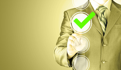 business man touching, pressing modern button with green ticking Check Box.