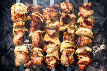 Barbecue skewers with grilled pork meat on the brazier
