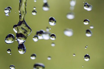 hoisting, close-up, nostalgia, window, cothes, sky

Raindrops on a rope for clothes on a blurred background.