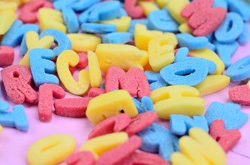 Many sugar letters on table