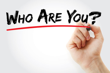 Hand writing Who Are You? with marker, concept background