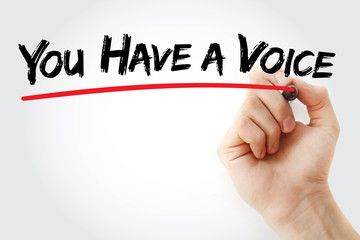 Hand writing You Have a Voice with marker, concept background