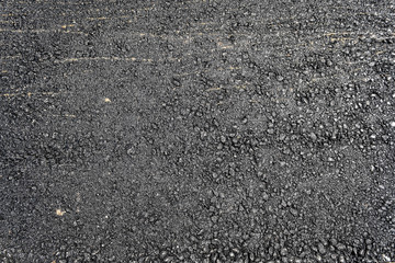 Real fresh black asphalt texture background.