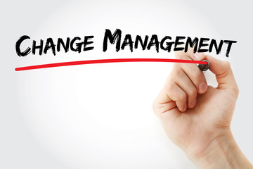 Hand writing Change Management with marker, concept background