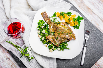 Grilled flounder with spinach and orange salsa with fresh mint