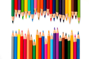 Row of color pencil on white background