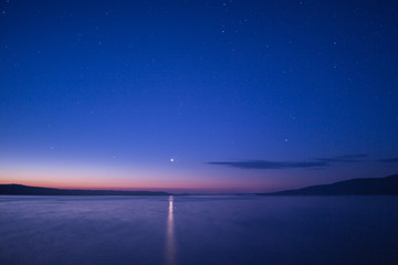 Lake scene at night, Finland