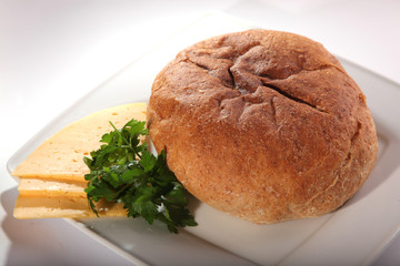 pita bread on plate with slices of cheese