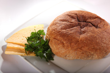pita bread on plate with slices of cheese