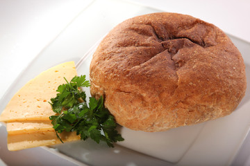 pita bread on plate with slices of cheese