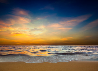 Obraz na płótnie Canvas Sunset at beach