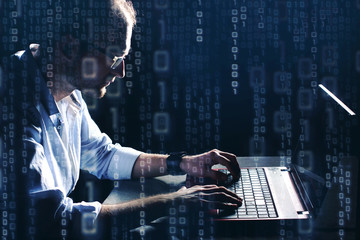 hacker at work with graphic user interface around