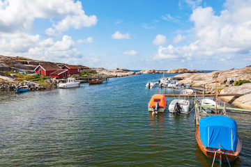 Boats moored at the pier of the bay