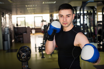 Man Boxing At Gym