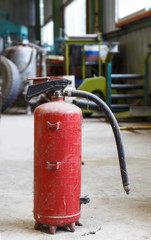Fototapeta na wymiar Obsolete and old fire extinguisher i