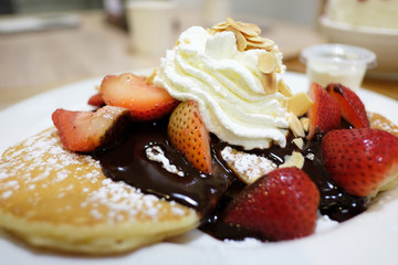 Strawberry Pancake Bakery whipped cream Top view, close-up