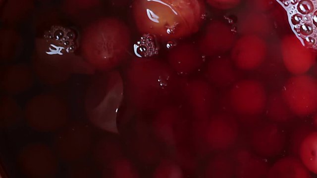 Serving kompot juice with a ladle