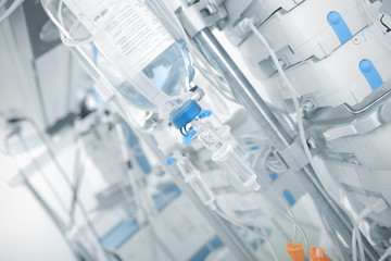 Iv drip in ward on the background of modern equipment