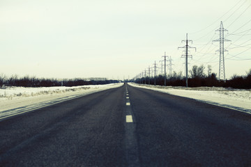 Fototapeta na wymiar Winter road at the countryside