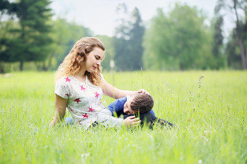 Fototapeta premium mother gently stroked her son