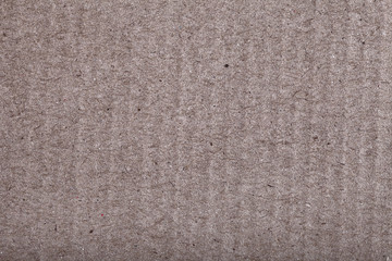 Ribbed cardboard textured background with blank space