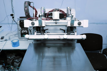 Screen printing machine in the printing workshop