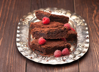 Chocolate brownie cake on a silver plate