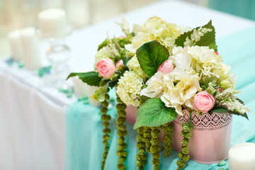 Wedding table decorations in tiffany colour.