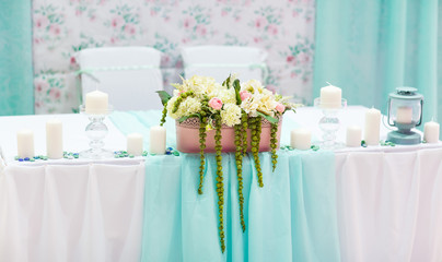 Wedding table decorations in tiffany colour.