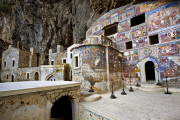 Turkey. Region Macka of Trabzon city - the Sumela Monastery (1600 year old Greek Orthodox monastery of the Panaghia). Rock Church - the inner and outer walls are decorated with frescoes - obrazy, fototapety, plakaty