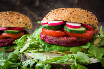 Veggie beet burger on wood table
