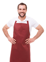 Smiling man with red apron