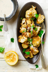 the baked cauliflower with sauce.