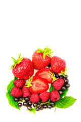Mix of fresh and ripe berries isolated on white background.