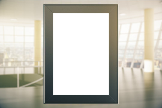 Blank picture frame in office
