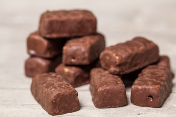 Mix of chocolate on wooden table, close-up